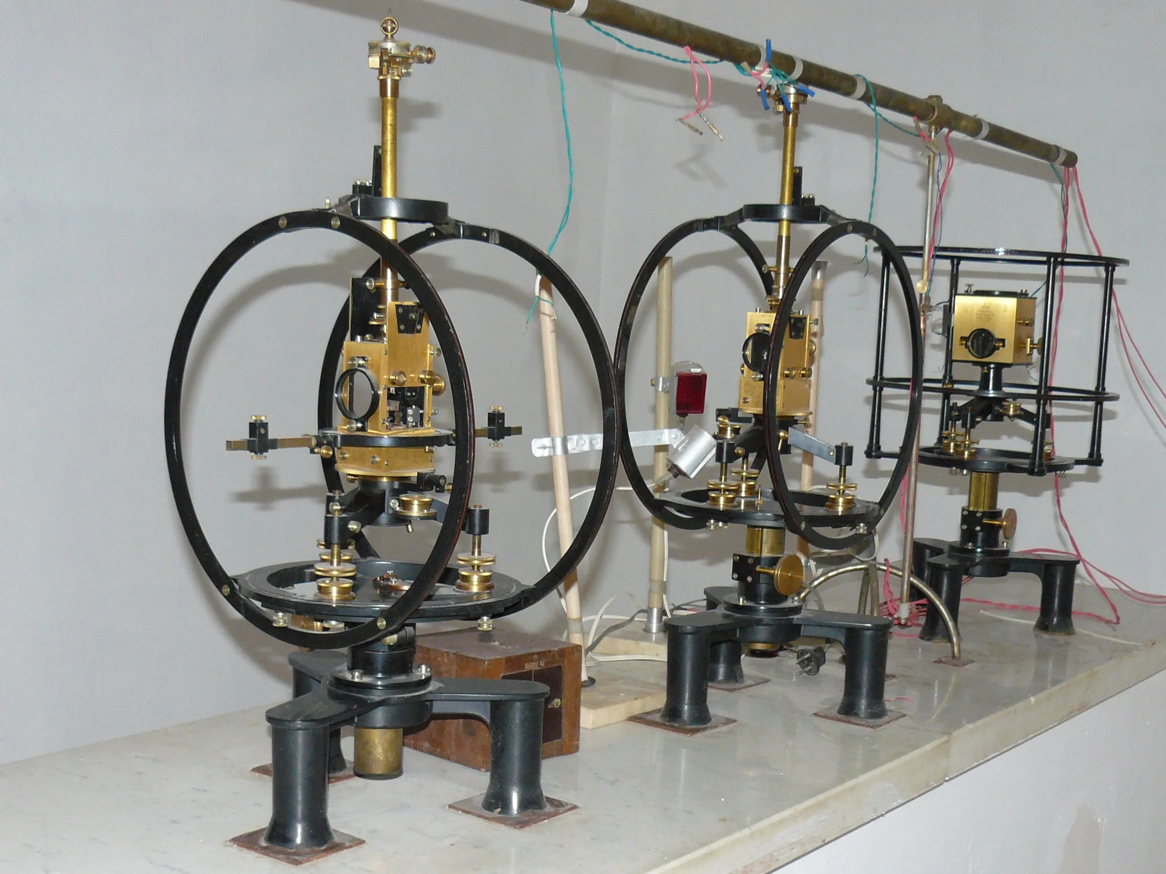 Askania variometers standing on their stone piers in the recording room of the Surlari geomagnetic observatory